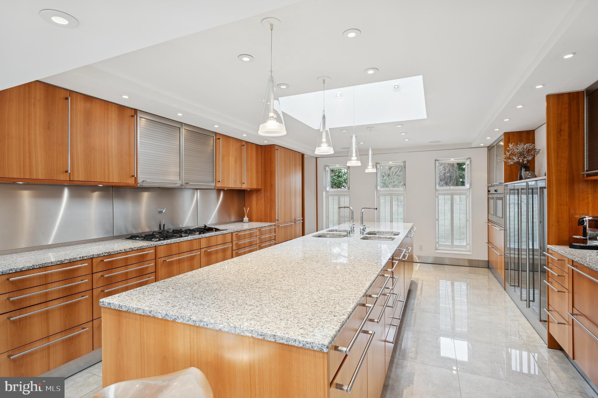 95 Lane Of Acres Haddonfield, NJ 08033 - Photo 20 of 114 a kitchen with stainless steel appliances granite countertop wooden cabinets a oven and granite counter tops with a stove