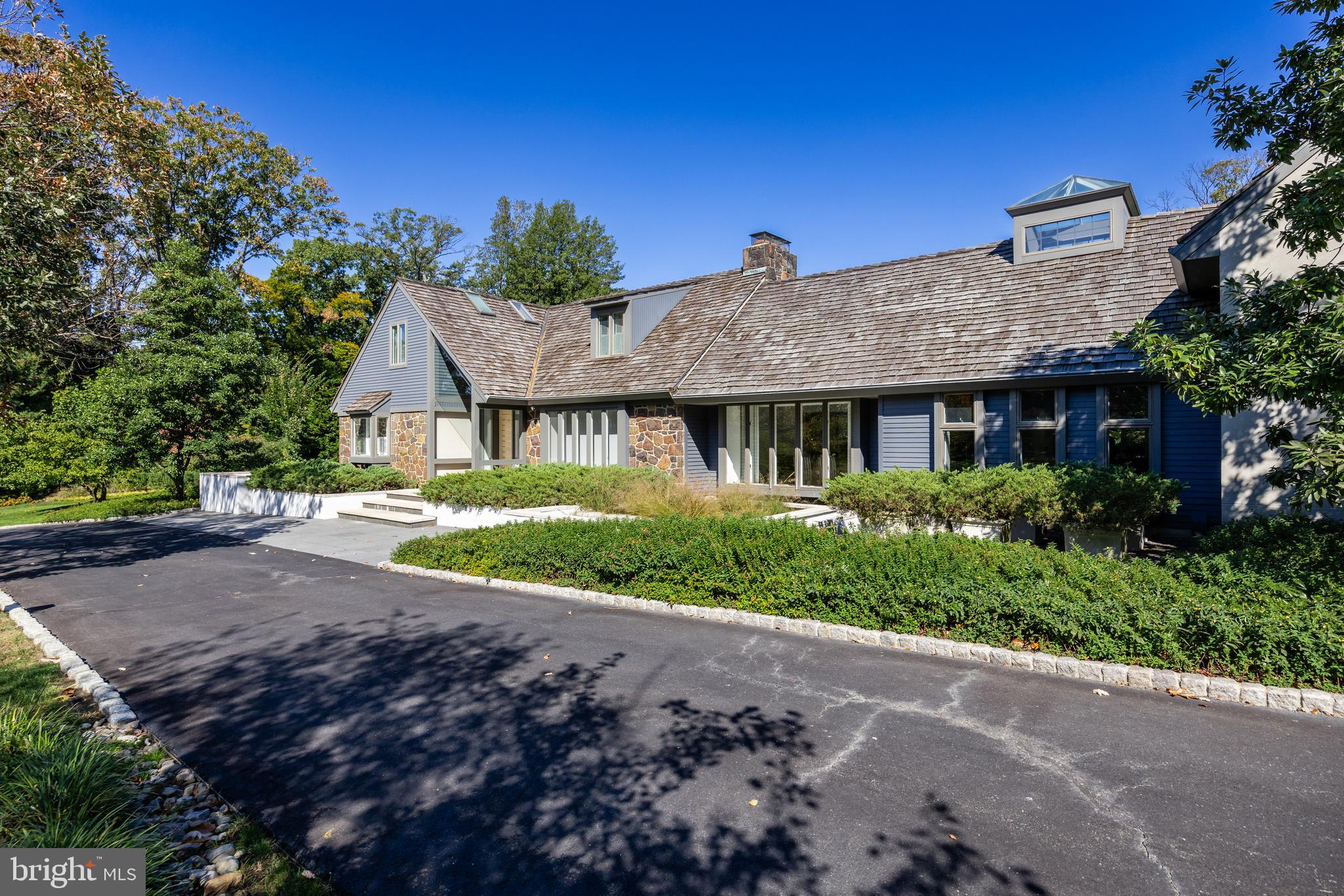 95 Lane Of Acres Haddonfield, NJ 08033 - Photo 2 of 114 a front view of a house with a yard and garage