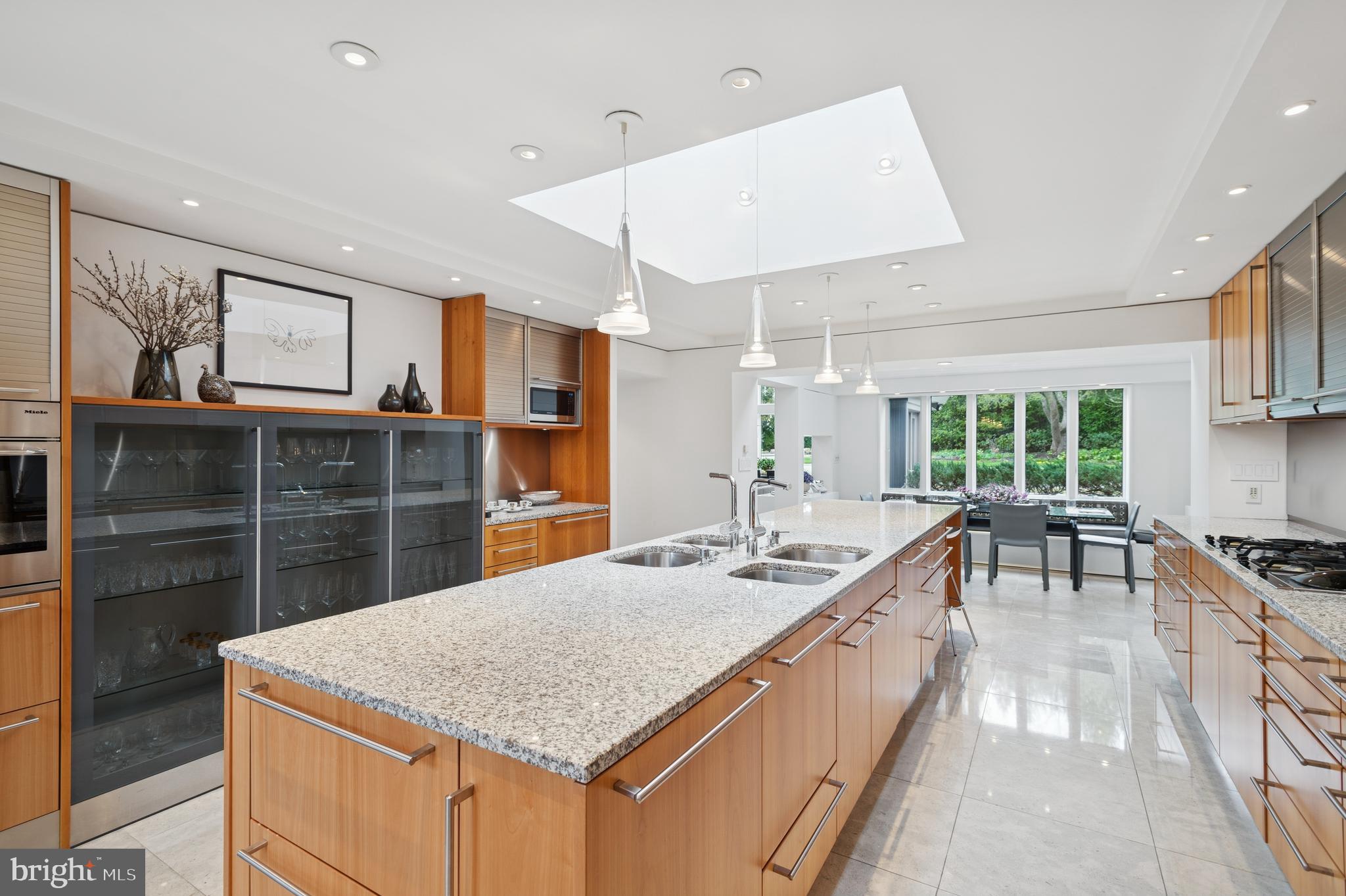 95 Lane Of Acres Haddonfield, NJ 08033 - Photo 21 of 114 a kitchen with stainless steel appliances granite countertop a sink and a refrigerator