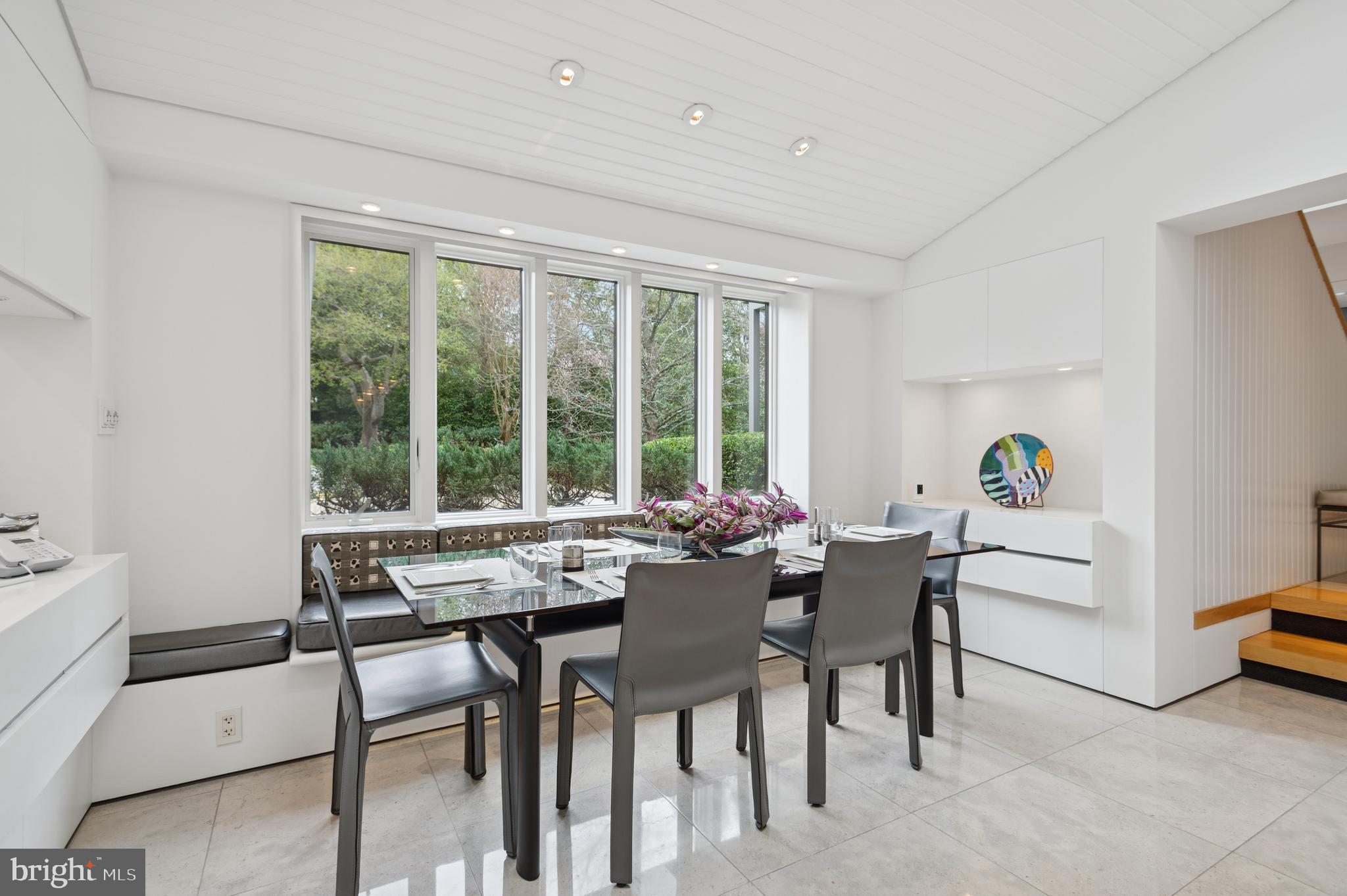 95 Lane Of Acres Haddonfield, NJ 08033 - Photo 23 of 114 a dining room with furniture and a floor to ceiling window
