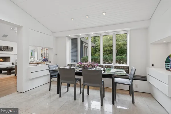 a bathroom with a double vanity sink and mirror