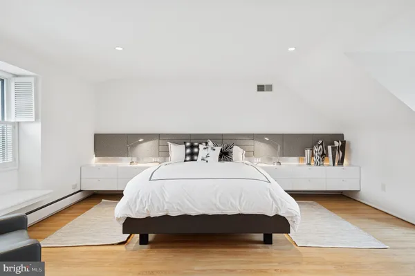 an aerial view of a house with a yard and garden