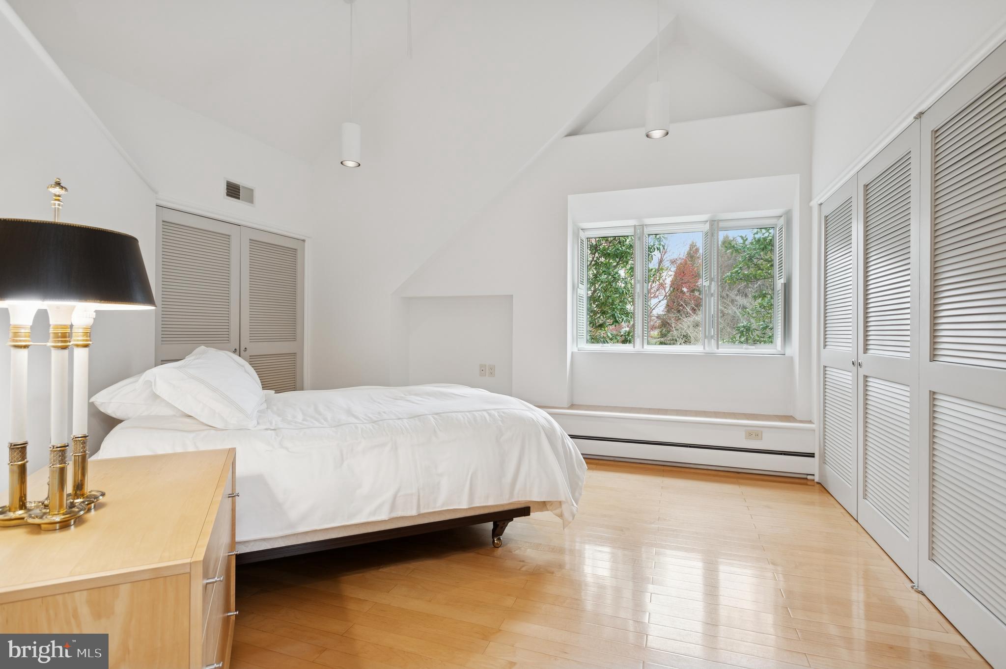 95 Lane Of Acres Haddonfield, NJ 08033 - Photo 49 of 114 a bedroom with a bed and a flat tv screen on dresser