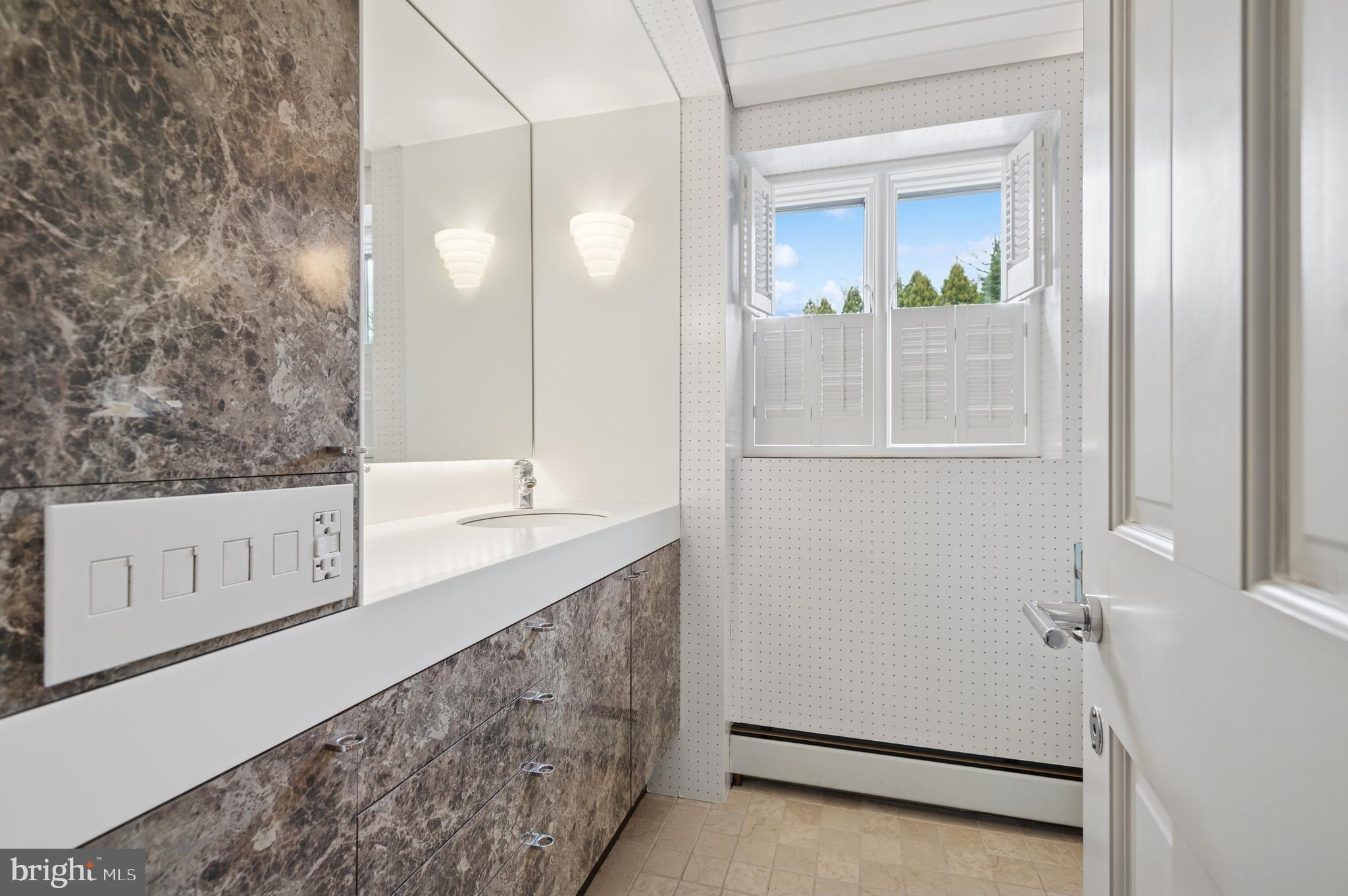 95 Lane Of Acres Haddonfield, NJ 08033 - Photo 51 of 114 a bathroom with a double vanity sink and mirror