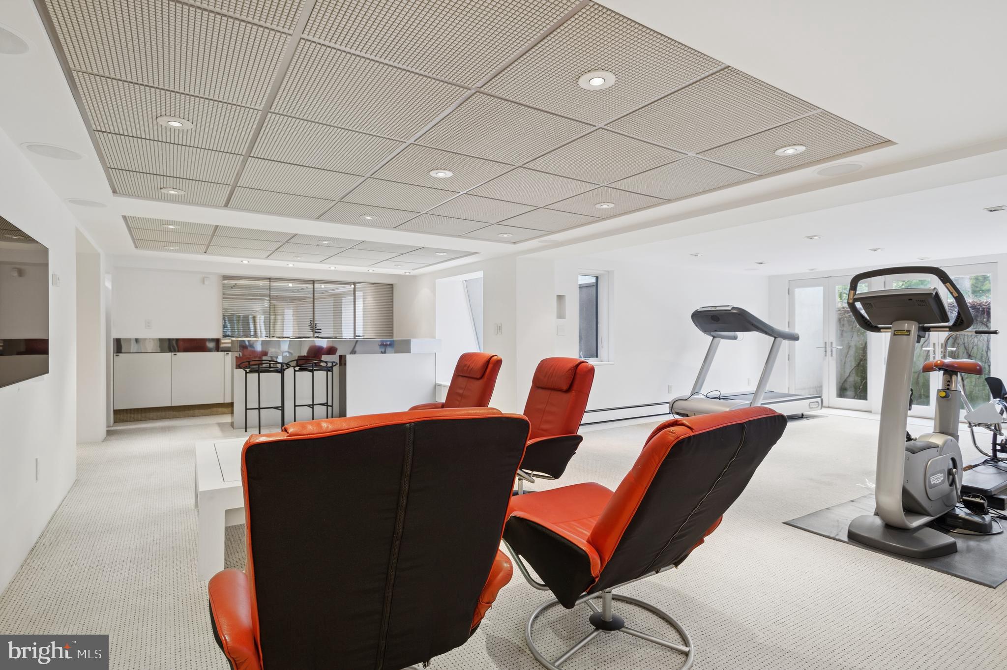 95 Lane Of Acres Haddonfield, NJ 08033 - Photo 58 of 114 a living room with furniture a flat screen tv and kitchen view
