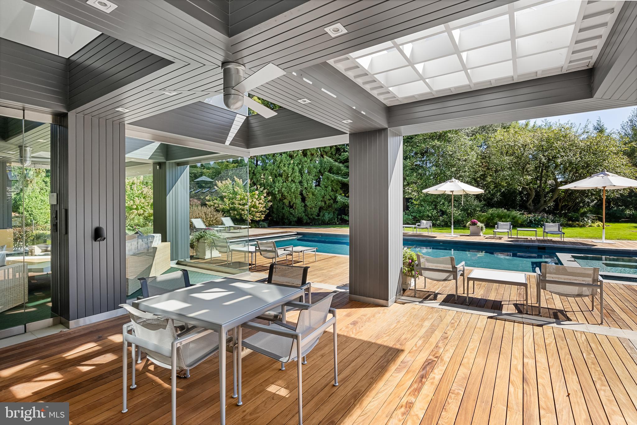 95 Lane Of Acres Haddonfield, NJ 08033 - Photo 72 of 114 a view of a patio with a table chairs and a table