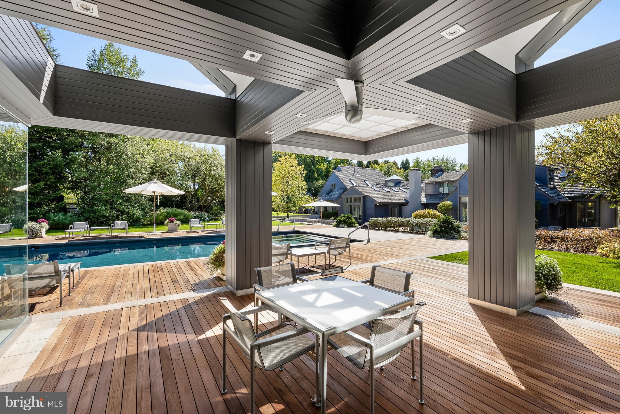95 Lane Of Acres Haddonfield, NJ 08033 - Photo 73 of 114 a view of a patio with a table chairs and a patio