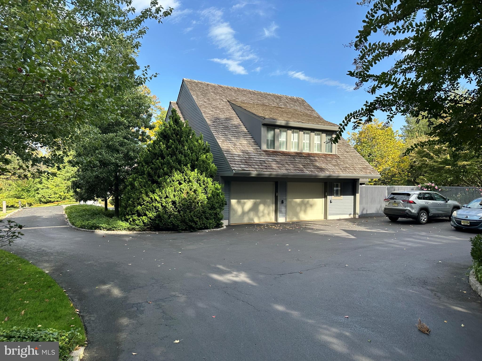 95 Lane Of Acres Haddonfield, NJ 08033 - Photo 8 of 114 a view of a house with a garden and parking