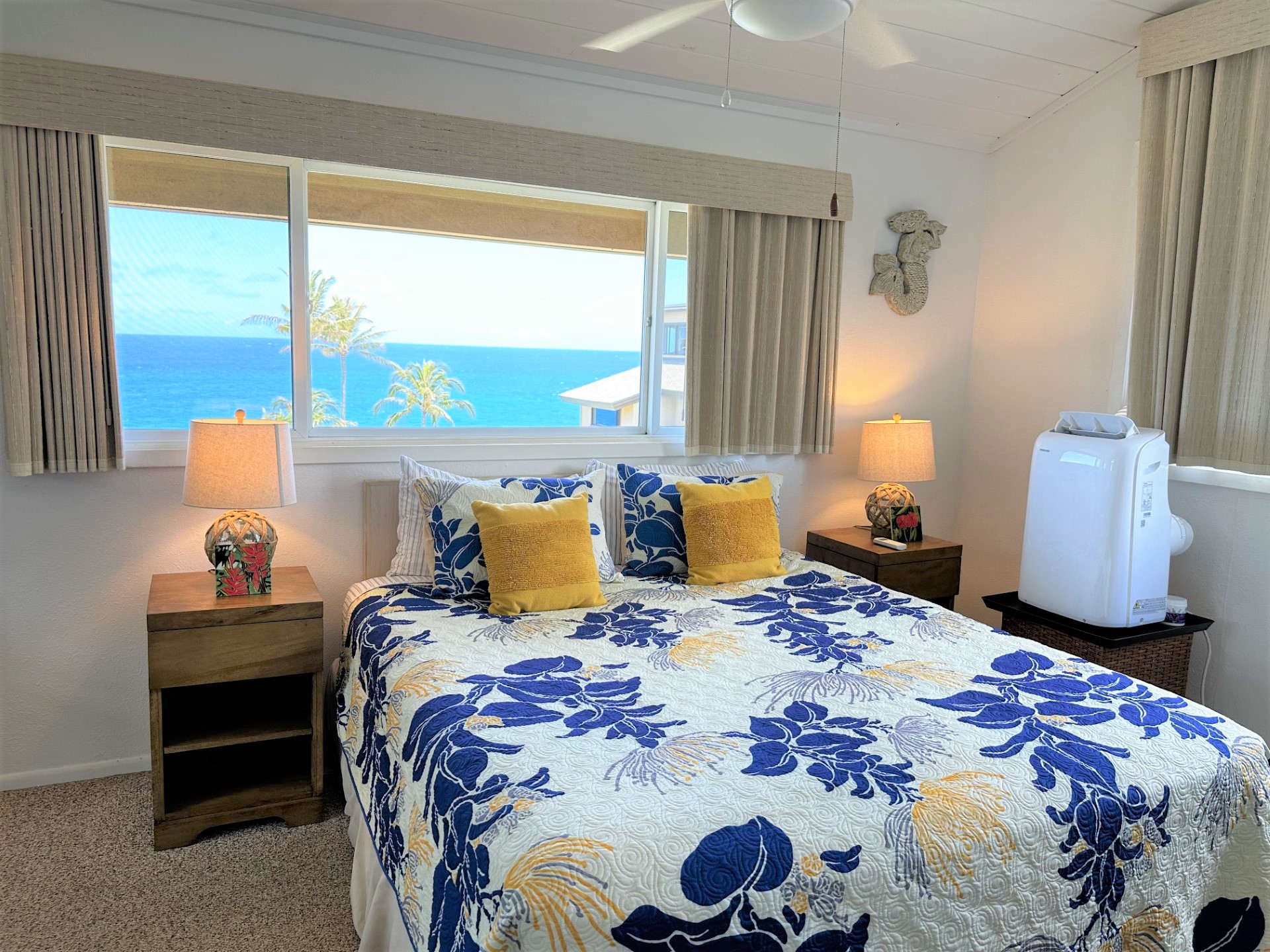1661 Pee Road, Unit IIA312 Koloa, HI 96756 - Photo 8 of 30 a bedroom with a bed and a window