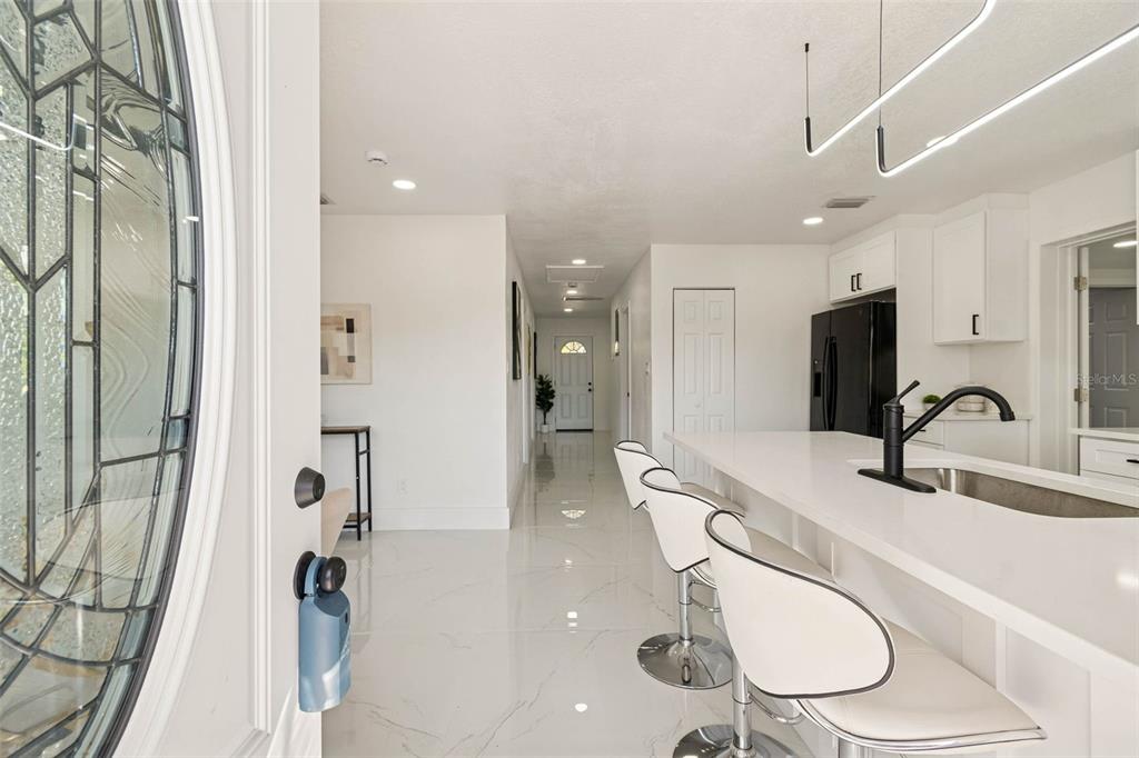 7097 Delta Way Clearwater, FL 33764 - Photo 17 of 71 a bathroom with a sink a toilet and shower