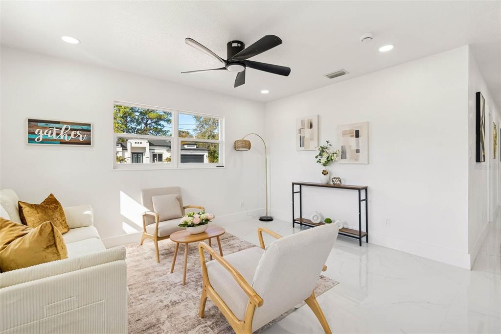 7097 Delta Way Clearwater, FL 33764 - Photo 18 of 71 a living room with furniture and a window