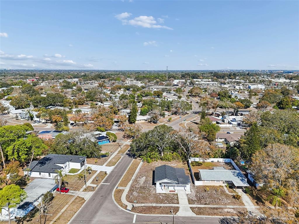 7097 Delta Way Clearwater, FL 33764 - Photo 63 of 71 an aerial view of residential houses with outdoor space