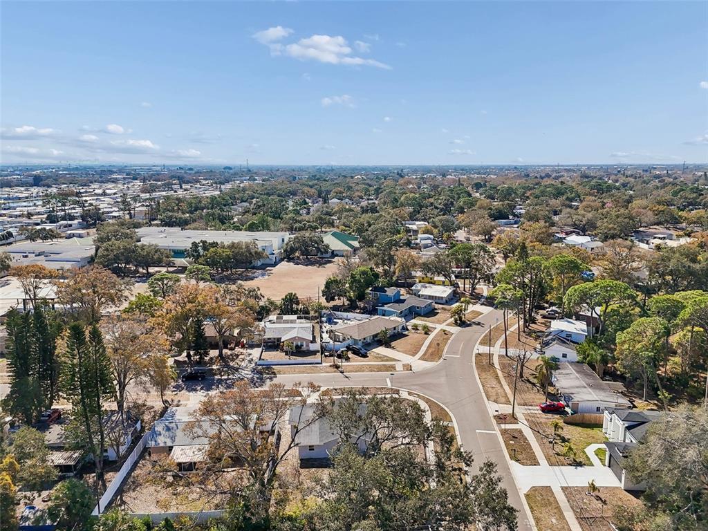 7097 Delta Way Clearwater, FL 33764 - Photo 66 of 71 an aerial view of a city with lots of residential buildings