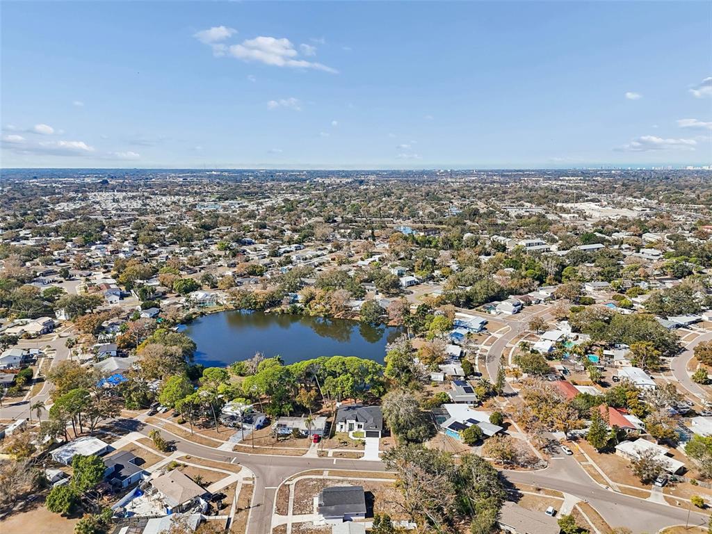 7097 Delta Way Clearwater, FL 33764 - Photo 69 of 71 an aerial view of residential building and green space