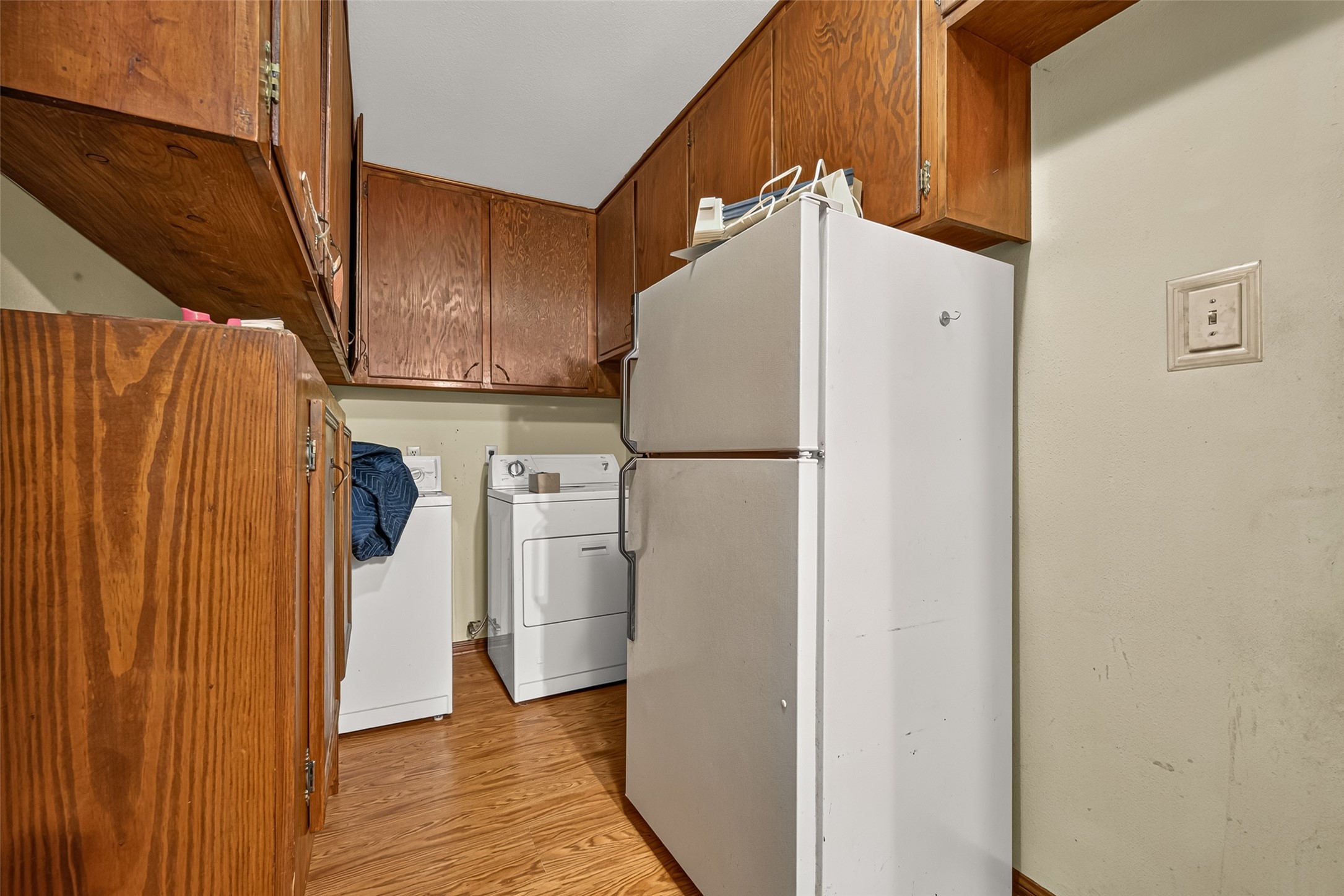 5311 Alba Road Houston, TX 77091 - Photo 9 of 27 Oversized Laundry room right off the kitchen and houses a half bath.