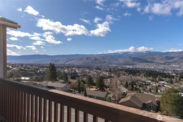 a view of a city from a balcony