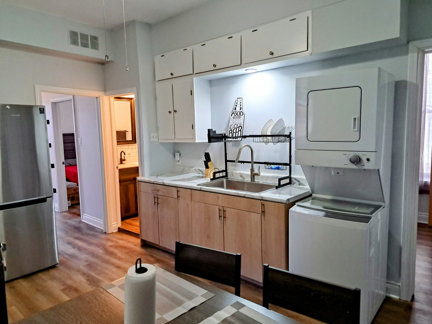 1540 West 17th Street, Unit 2 Chicago, IL 60608 - Photo 14 of 22 a kitchen with stainless steel appliances granite countertop a sink and a refrigerator