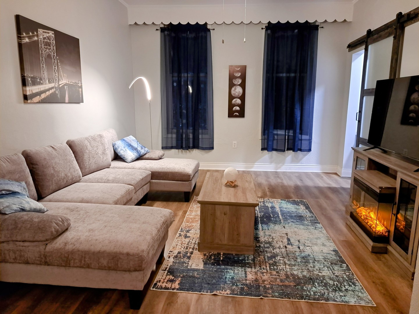 1540 West 17th Street, Unit 2 Chicago, IL 60608 - Photo 19 of 22 a living room with furniture and a flat screen tv
