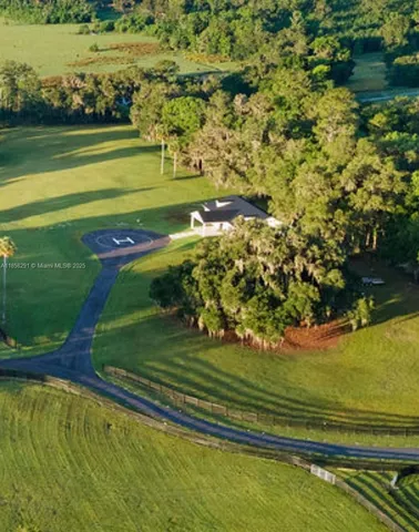 a view of a golf course with a lake