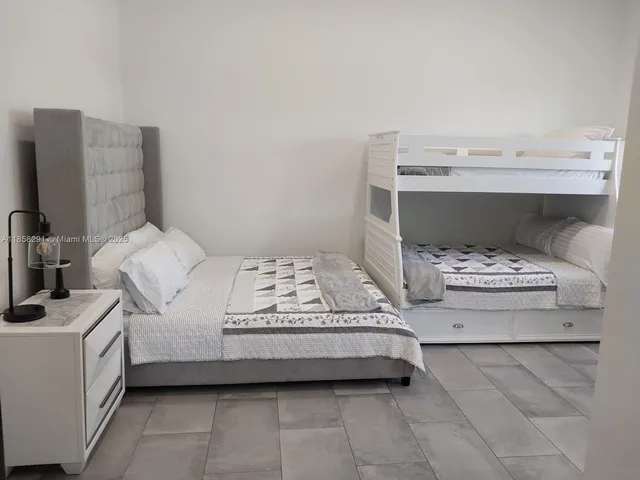 a view of bedroom with furniture