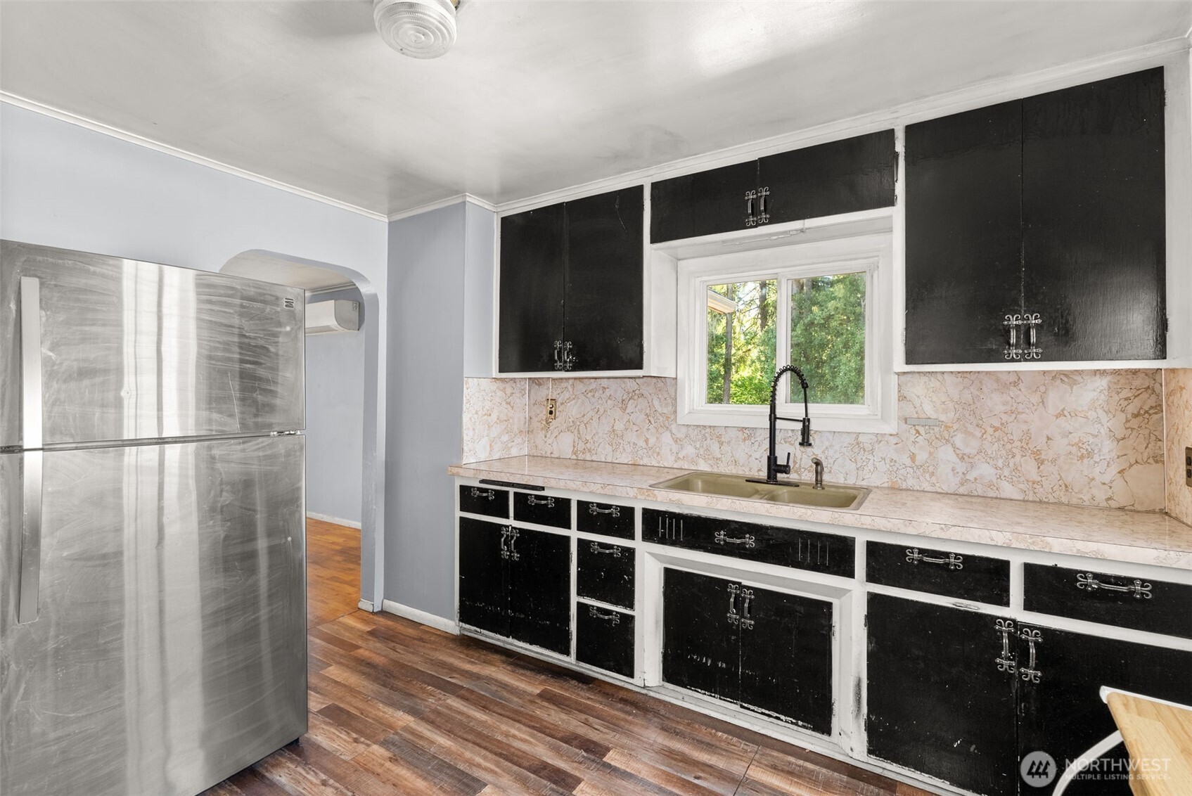 1335 Centralia Alpha Road Chehalis, WA 98532 - Photo 11 of 32 a kitchen with stainless steel appliances a sink stove and refrigerator