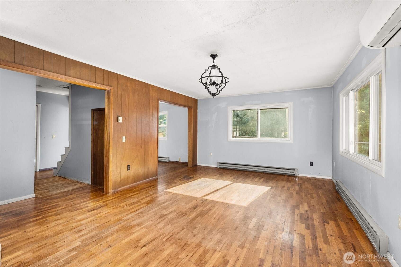 1335 Centralia Alpha Road Chehalis, WA 98532 - Photo 8 of 32 wooden floor in an empty room with a window