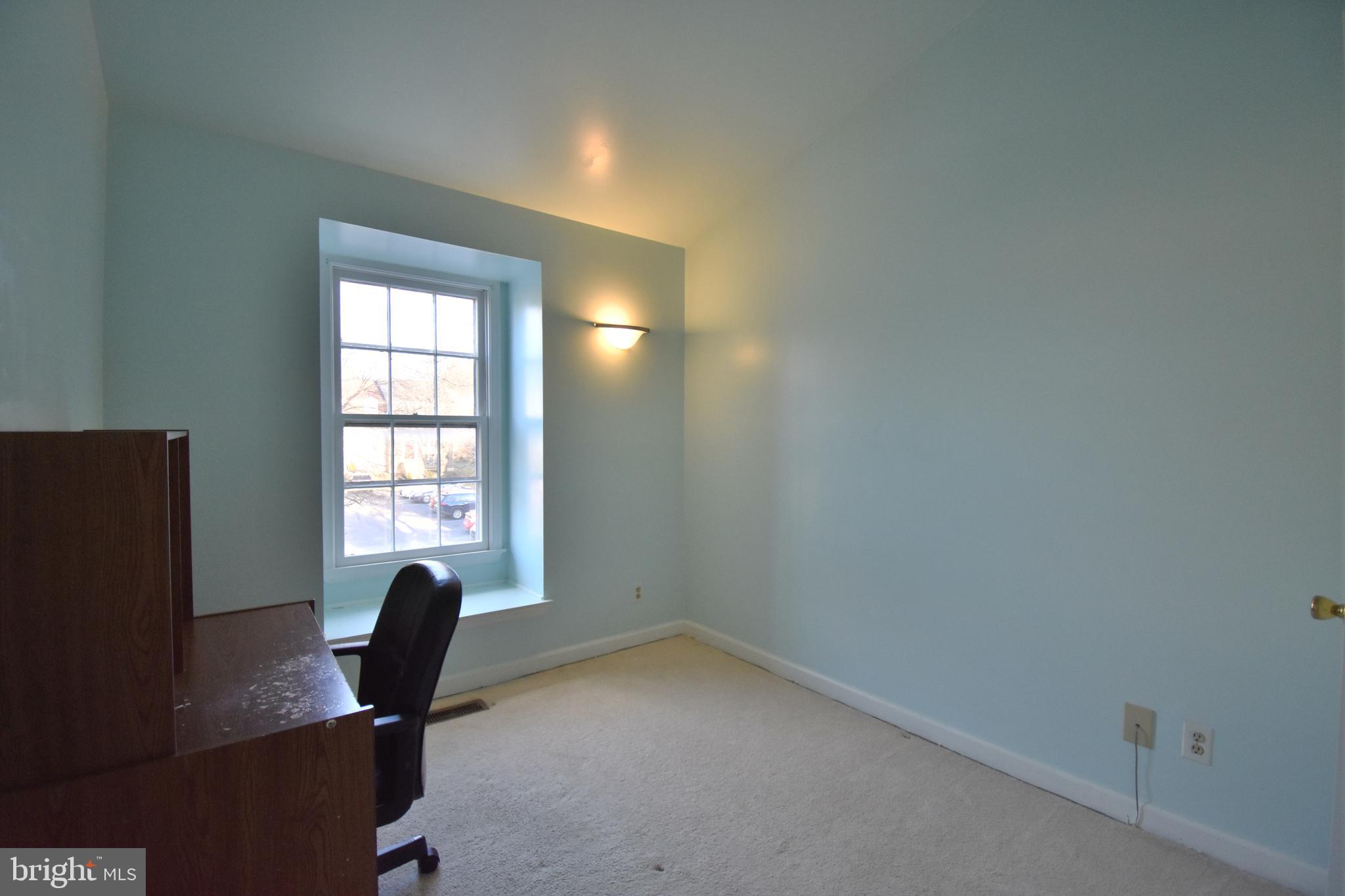 13233 Copeland Court Silver Spring, MD 20904 - Photo 13 of 20 a view of a workspace with furniture and a window