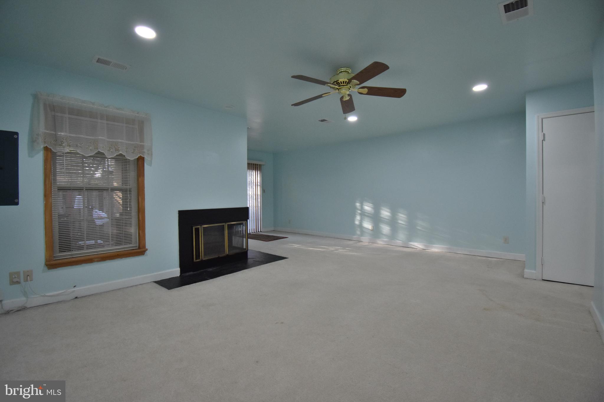 13233 Copeland Court Silver Spring, MD 20904 - Photo 18 of 20 a view of a livingroom with a fireplace