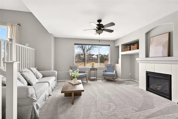a living room with furniture or fireplace and a large window