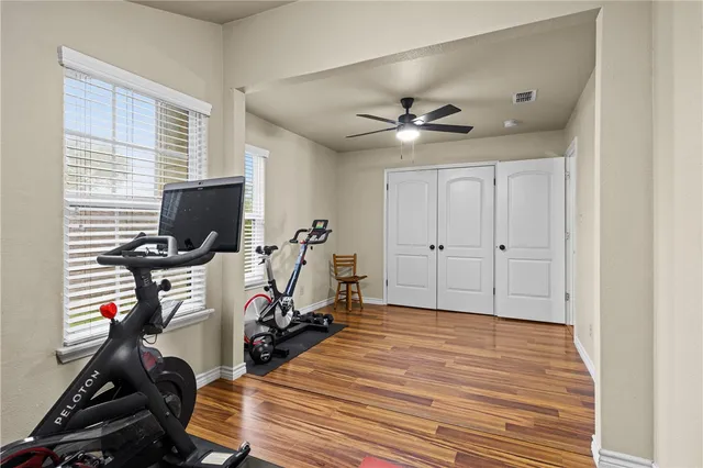 a view of a room with gym equipment