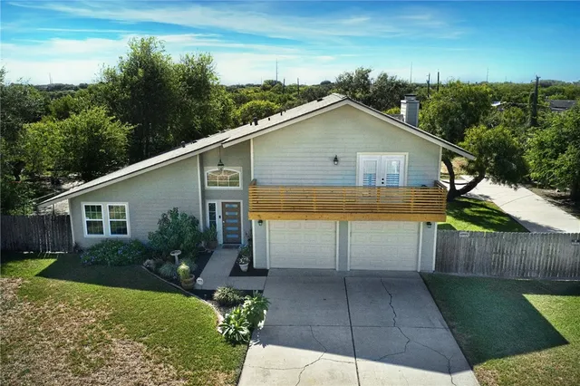 a view of backyard with swimming pool and outdoor seating