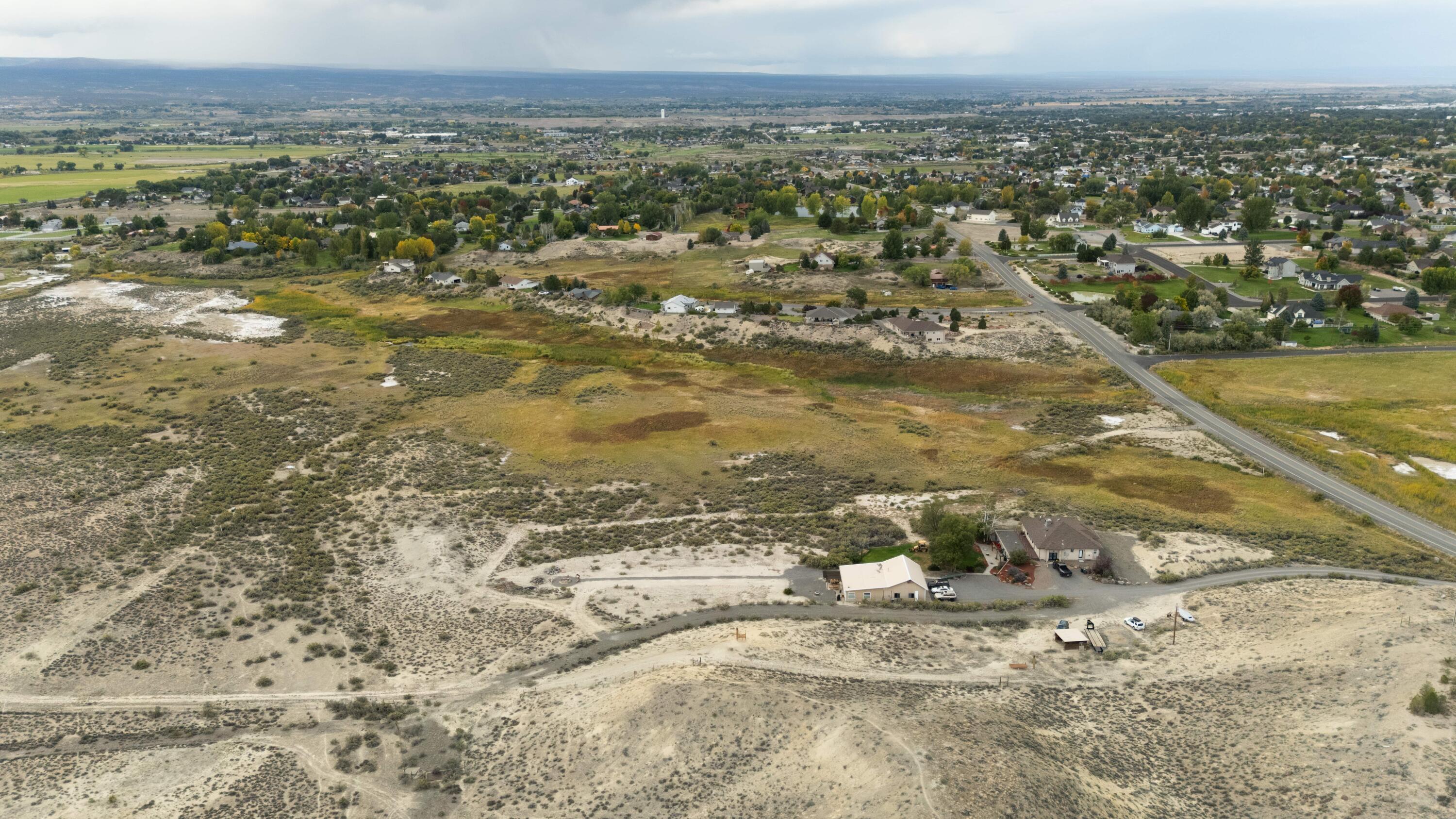 Tbd Oak Grove Road Montrose, CO 81401 - Photo 9 of 12 a view of a water with a mountain