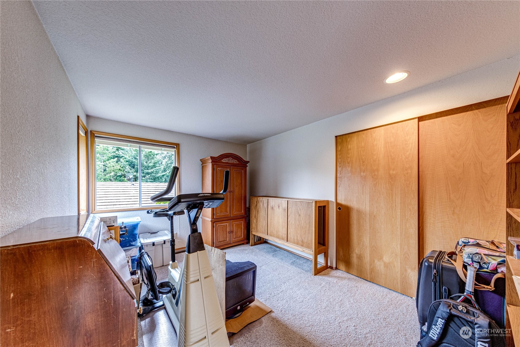 3213 211th Street Southeast Bothell, WA 98021 - Photo 23 of 33 a view of a room with gym equipment