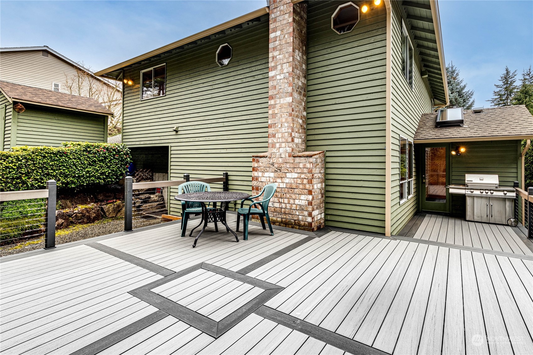 3213 211th Street Southeast Bothell, WA 98021 - Photo 27 of 33 a view of a patio with a table and chairs