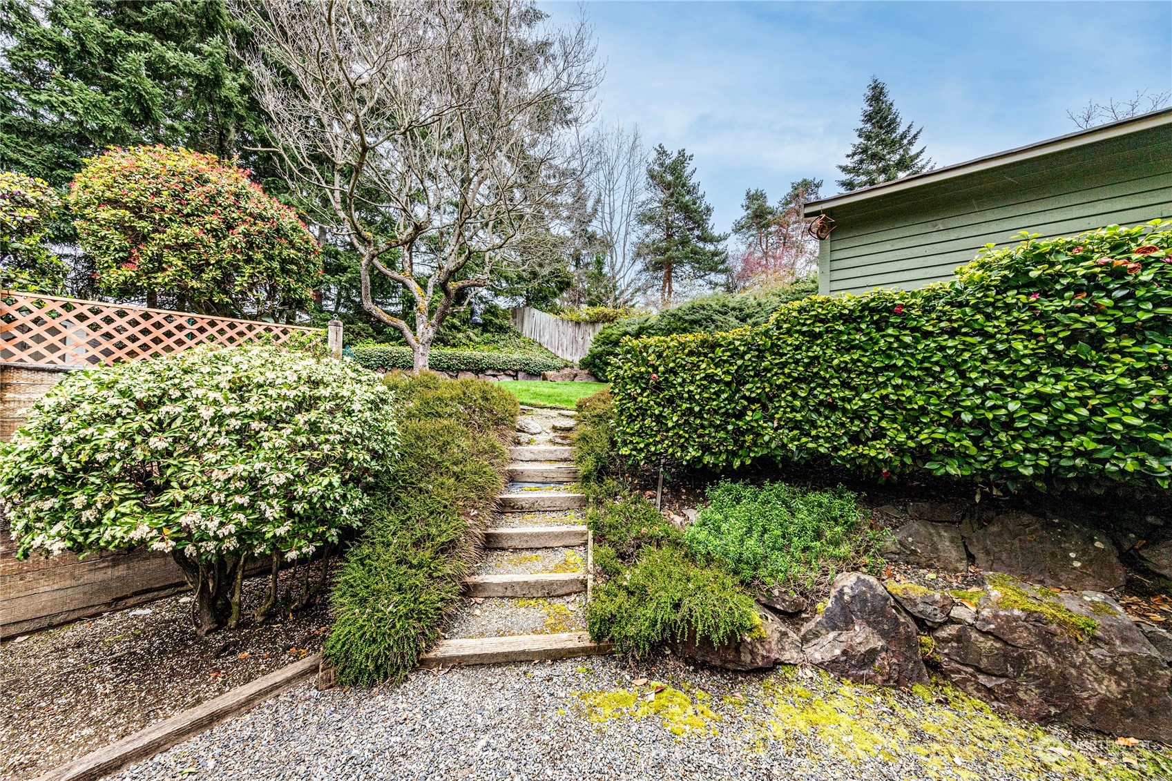 3213 211th Street Southeast Bothell, WA 98021 - Photo 29 of 33 a view of a garden with statue