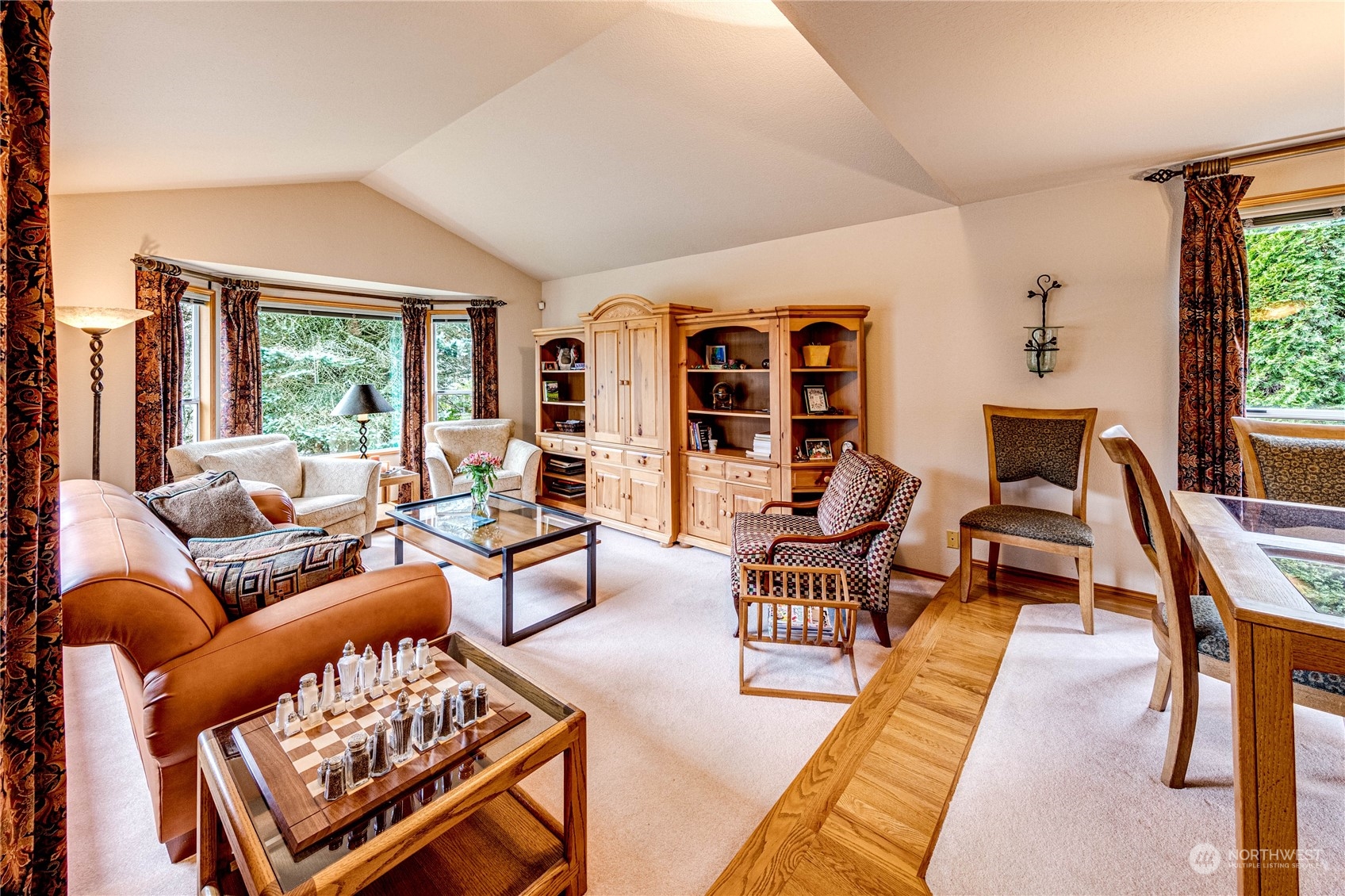 3213 211th Street Southeast Bothell, WA 98021 - Photo 4 of 33 a living room with furniture fireplace and a large window