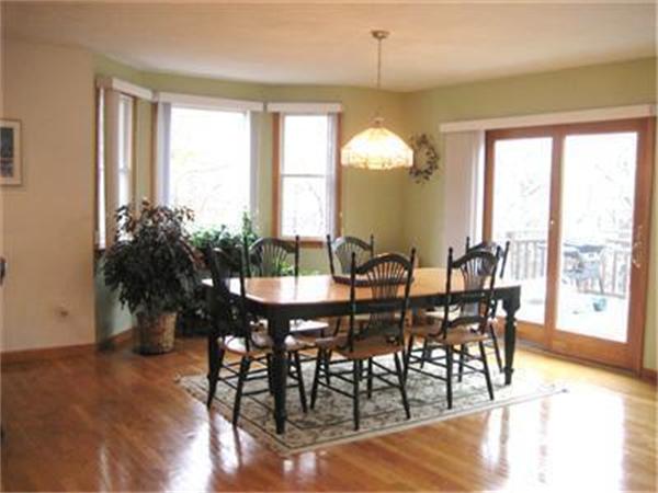 76 Cairn Ridge Road Falmouth, MA 02536 - Photo 5 of 6 a view of a dining room with furniture window and wooden floor