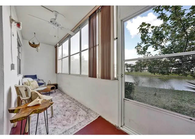 a view of a balcony and furniture