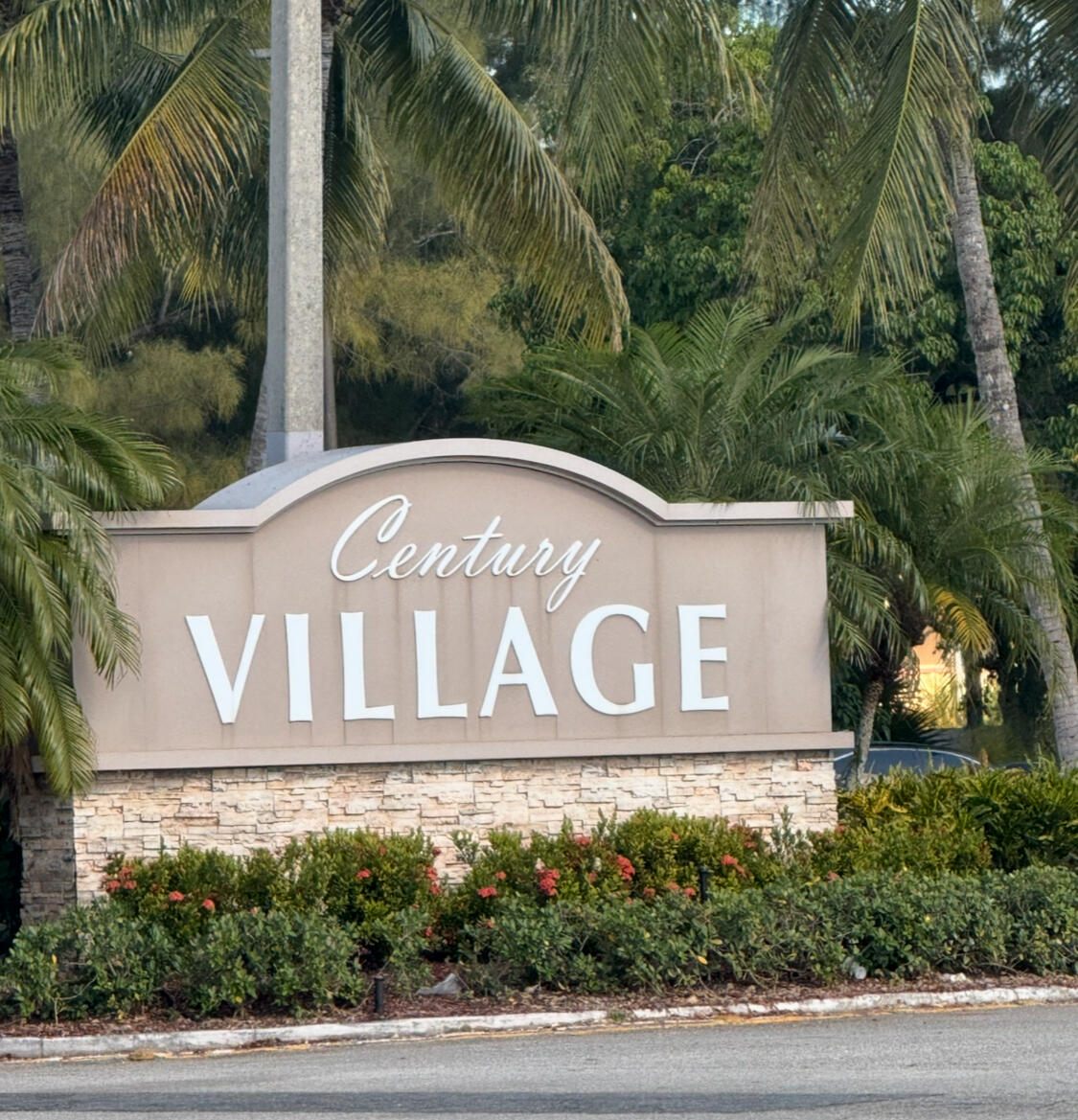 209 Northampton K, Unit K West Palm Beach, FL 33417 - Photo 18 of 24 a sign that is on the side of a building