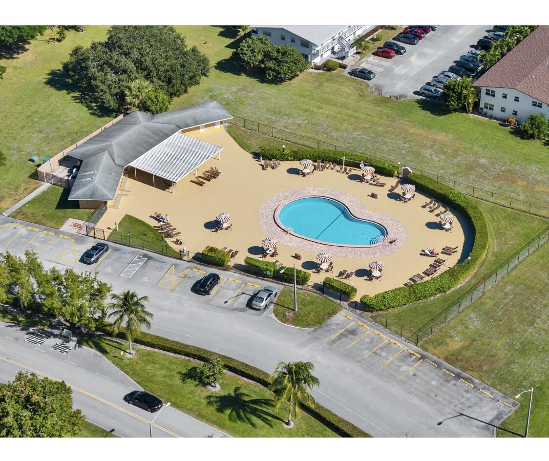 209 Northampton K, Unit K West Palm Beach, FL 33417 - Photo 20 of 24 an aerial view of a house with outdoor space