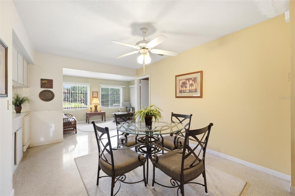 1830 South Mandarin Terrace Inverness, FL 34450 - Photo 10 of 47 a view of a dining room with furniture and a chandelier