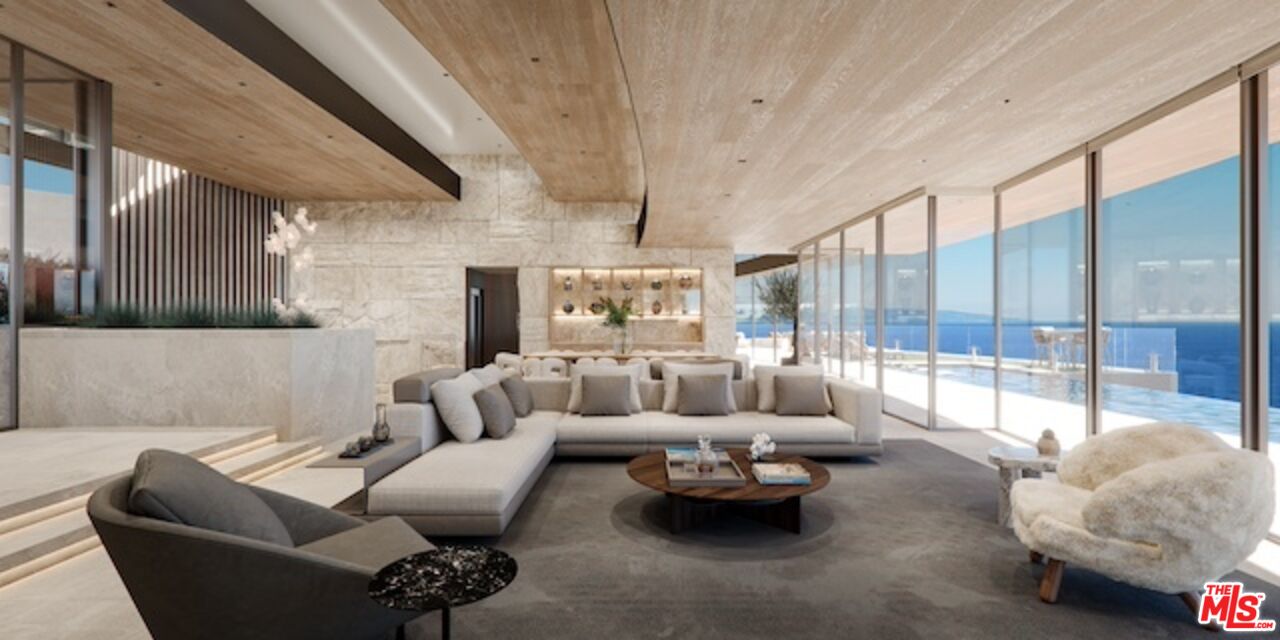 5024 Carbon Beach Terrace Malibu, CA 90265 - Photo 13 of 35 a living room with furniture and a large window