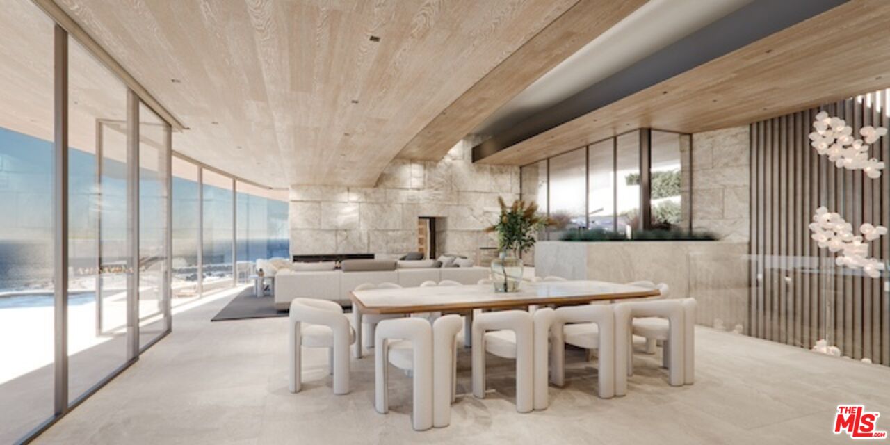 5024 Carbon Beach Terrace Malibu, CA 90265 - Photo 15 of 35 a dining hall with stainless steel appliances a table and chairs