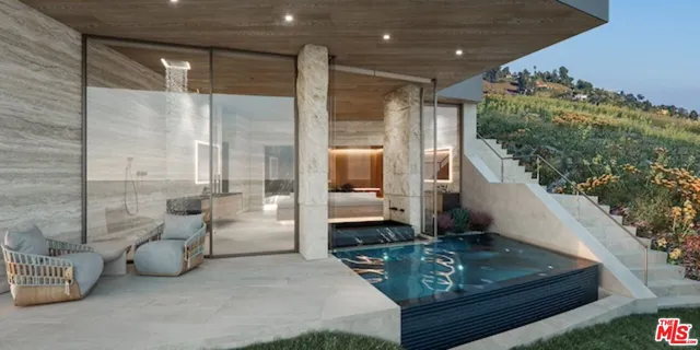 a bathroom with a large mirror