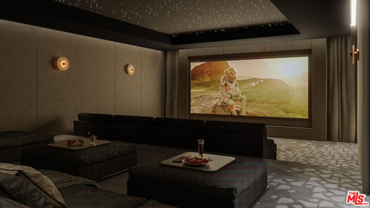 5024 Carbon Beach Terrace Malibu, CA 90265 - Photo 35 of 35 a living room with a couch and a table