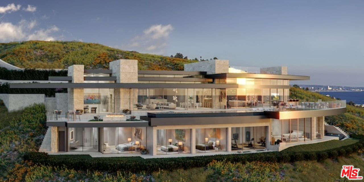 5024 Carbon Beach Terrace Malibu, CA 90265 - Photo 6 of 35 a front view of a building with river covered by trees