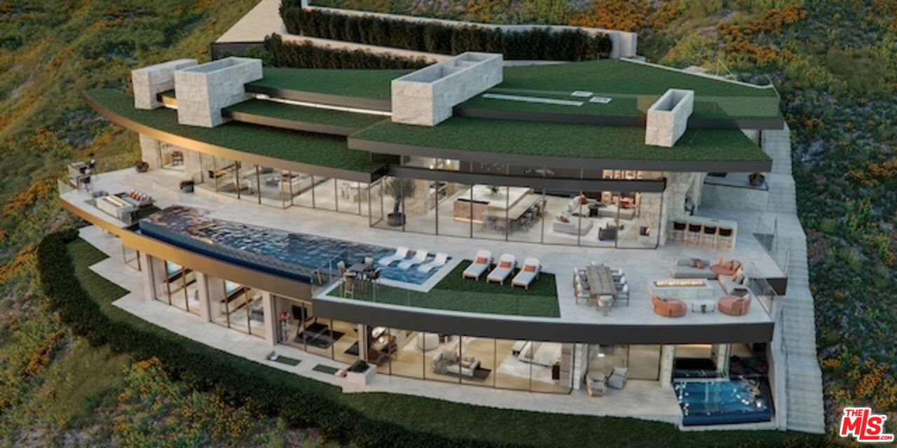 5024 Carbon Beach Terrace Malibu, CA 90265 - Photo 7 of 35 a front view of a building with street