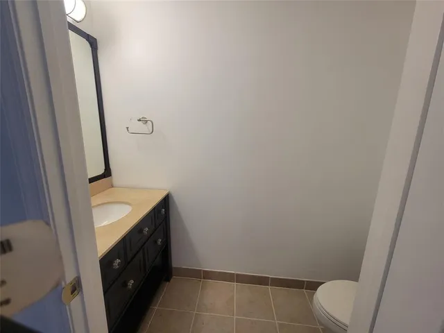 a bathroom with a sink and toilet