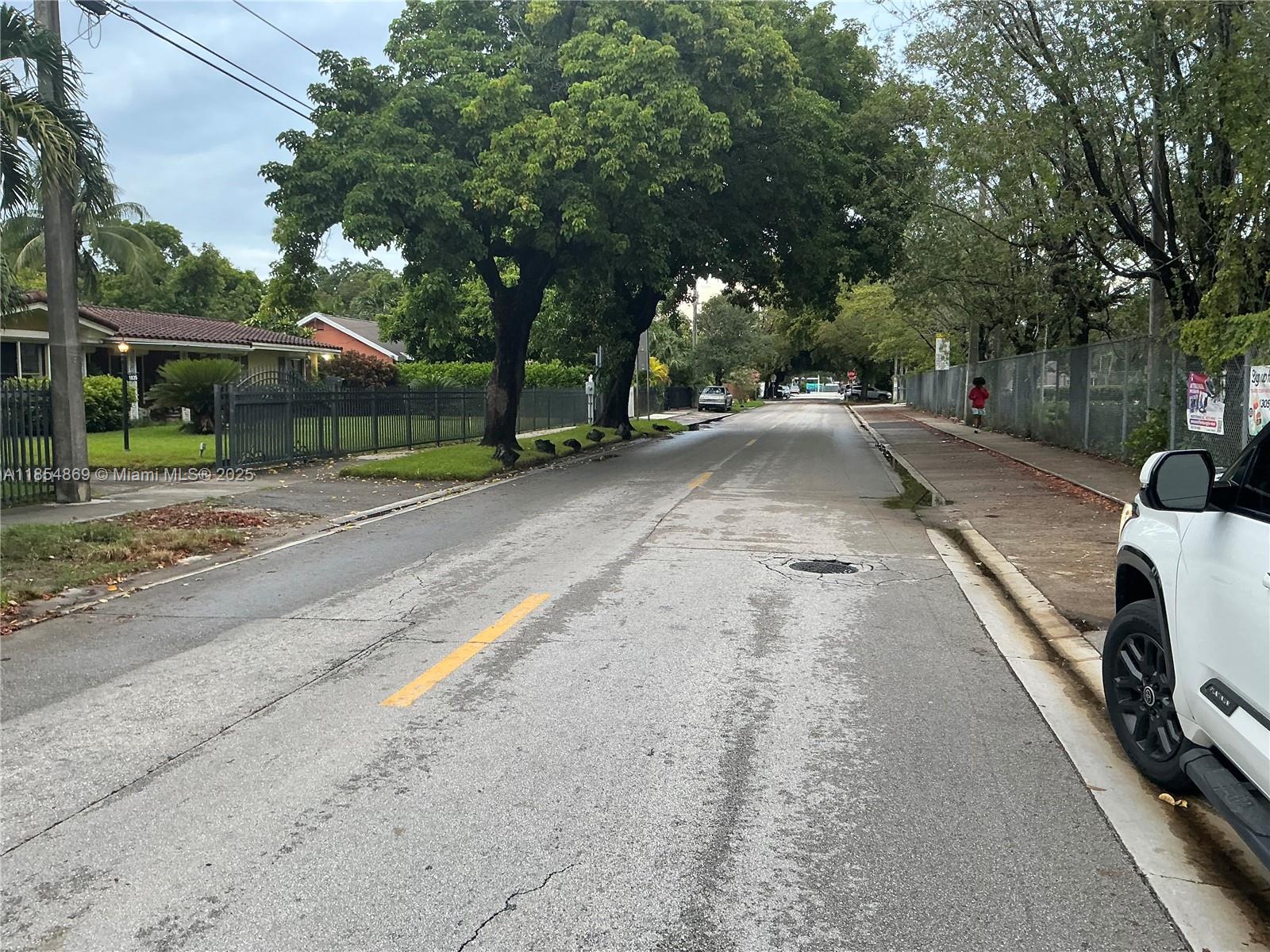 1855 Northwest 32nd Street Miami, FL 33142 - Photo 3 of 23 a view of a yard with plants and trees