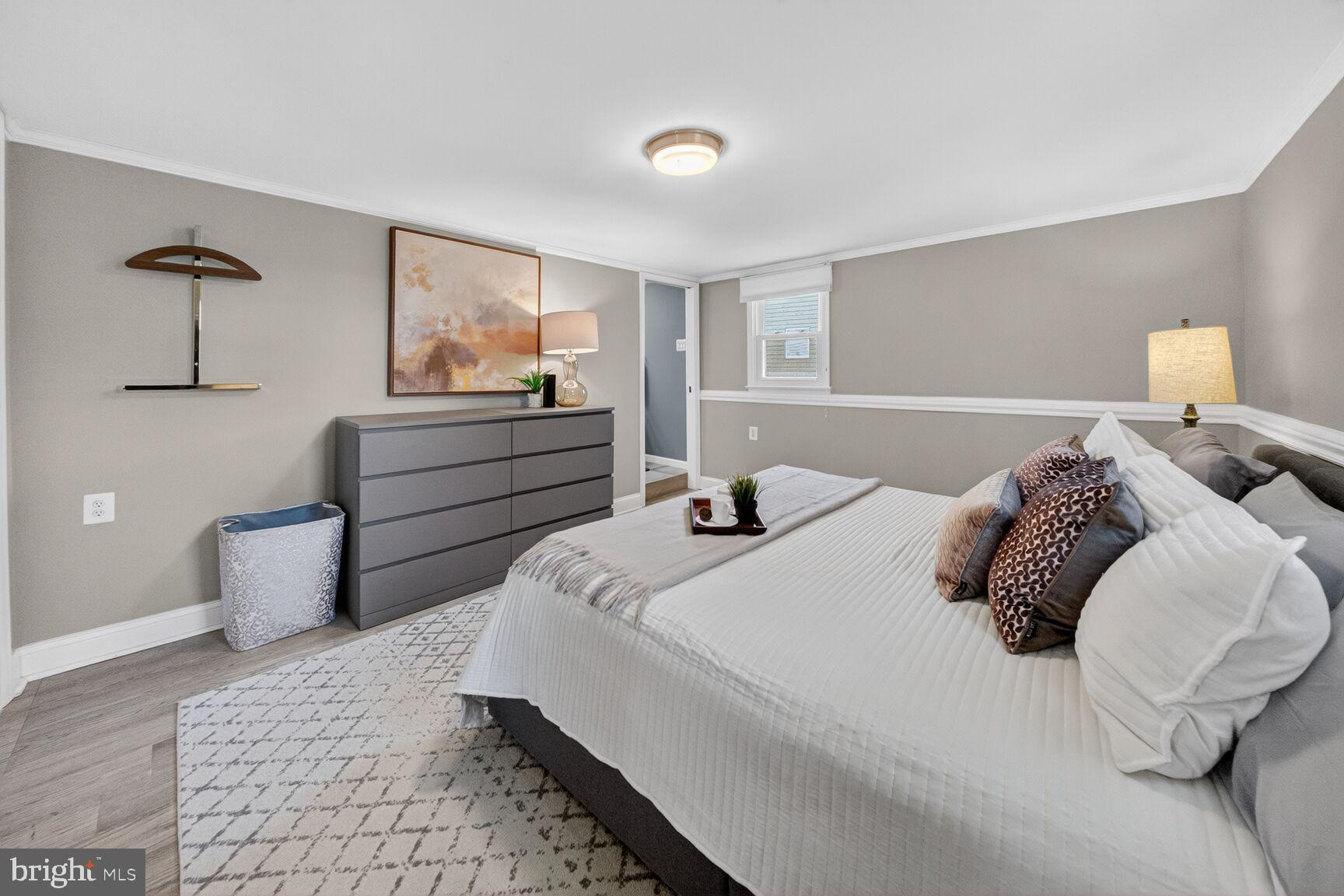 7007 Lemay Road Rockville, MD 20851 - Photo 15 of 37 a bedroom with a bed and window